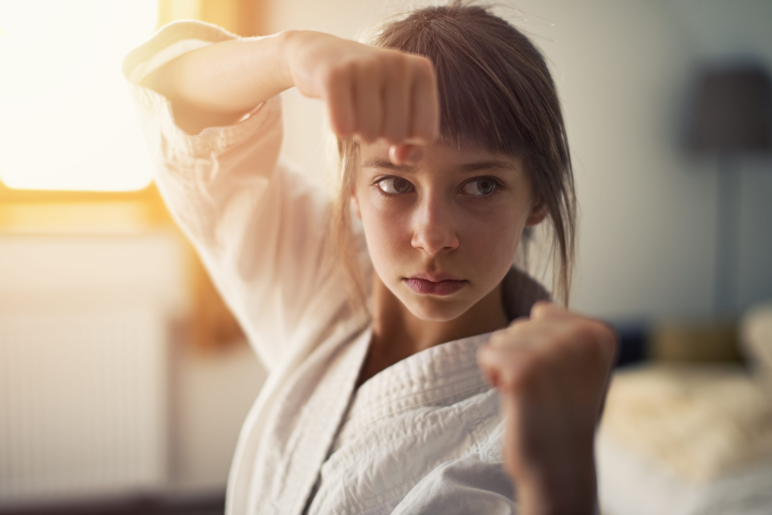 Little girl practicing karate